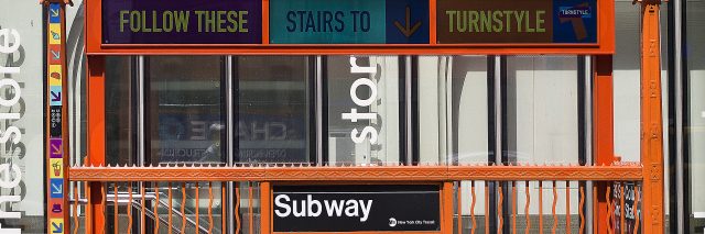 New York City subway entrance with no elevator is inaccessible to people with disabilities.