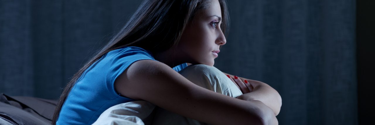 Getting Through Bipolar Disorder Mixed Episodes at Night Portrait of a young woman suffering from insomnia