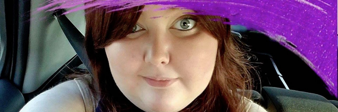 Having Infusions of Chemotherapy for Lupus selfie of a woman with text saying 'I am raising awareness for lupus awareness month'