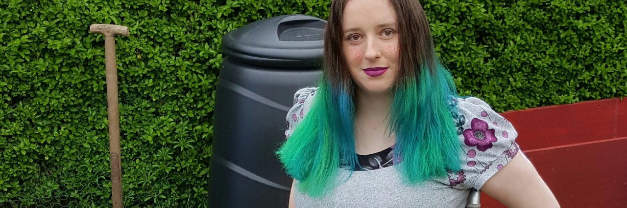 Trying to Vomit With GERD and Emetophobia woman sitting outside in a wheelchair next to a dog