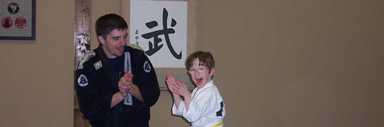 When Inclusion of Children With Disabilities Is Done Right Arlo with his karate teacher.