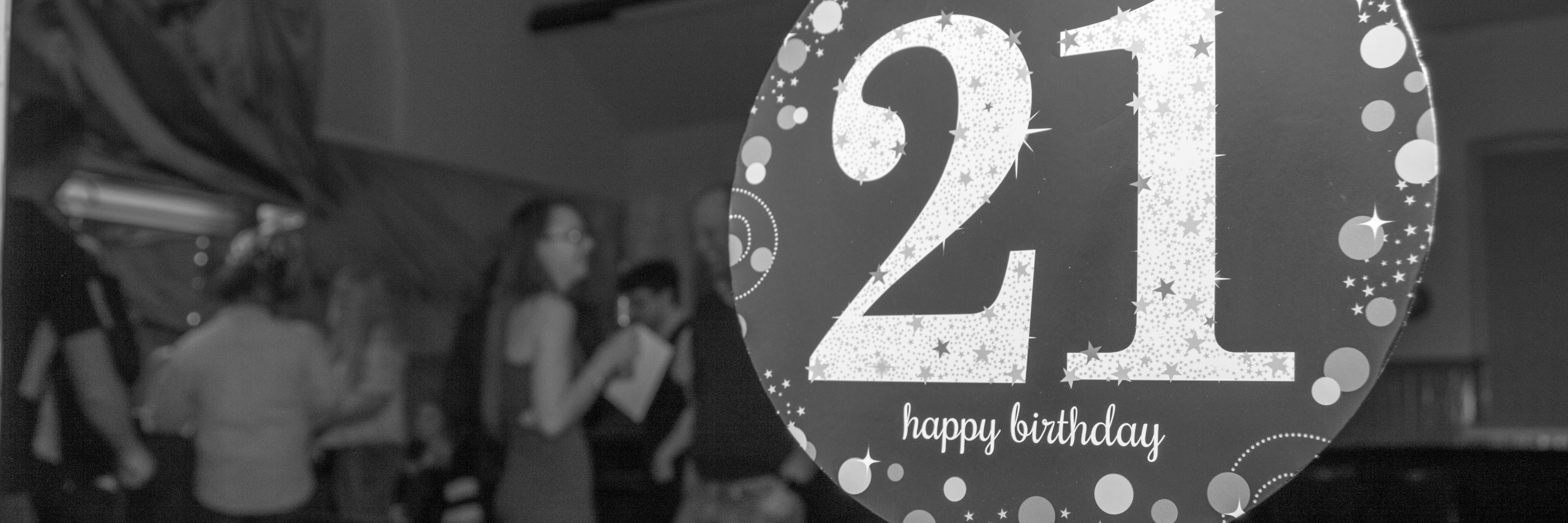 sign on window for 21st birthday party