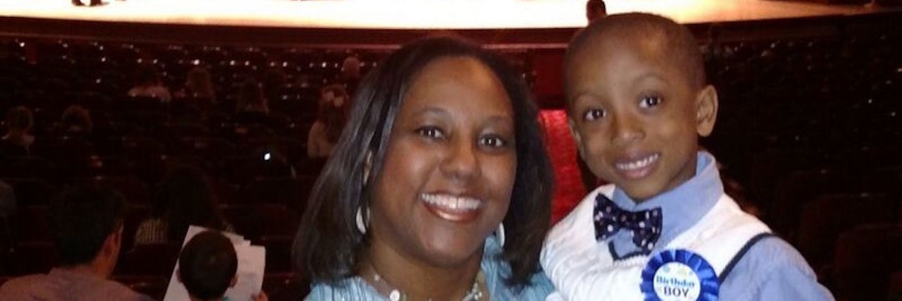 Parenting a Child With Eosinophilic Esophagitis (EoE) mother and son in the audience at a performance