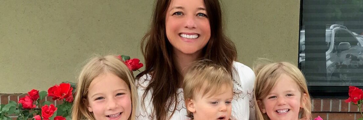 Growing Stronger, Becoming a Better Parent With Lyme Disease mother smiling with three children