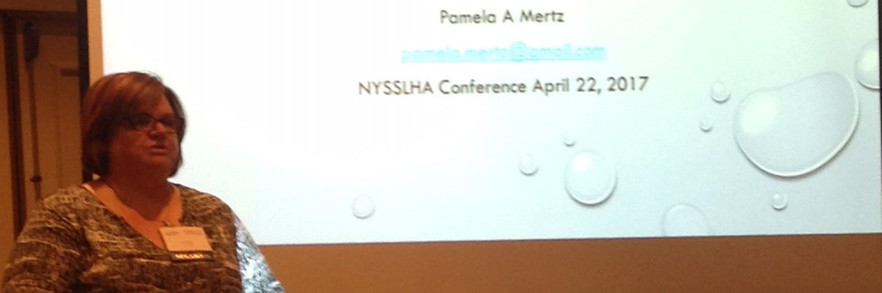 When the Person Who Stutters Is the Expert In the Room Pamela speaking at a conference.