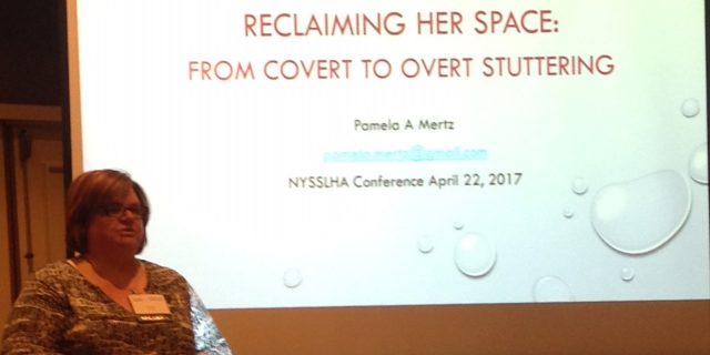 Pamela speaking at a conference.