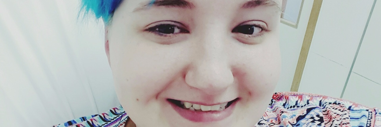 Fighting Chronic Pain, Illness Without a Diagnosis woman smiling in the hospital