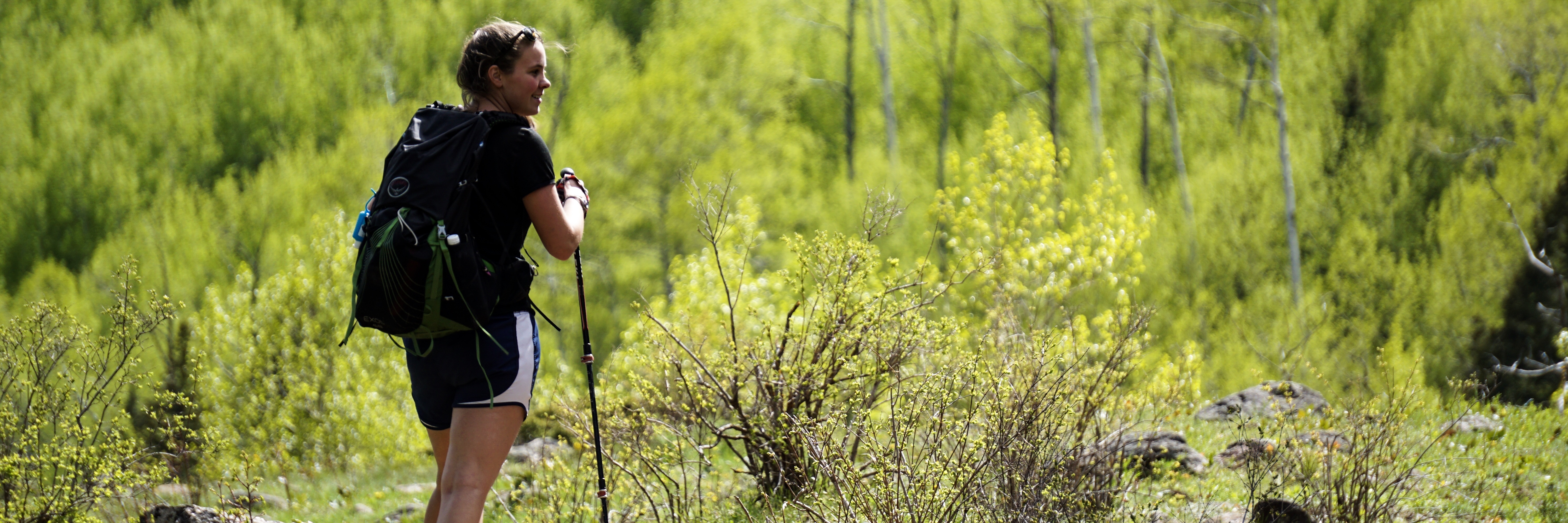 Why I Hike for Mental Health and Suicide Prevention young woman in hiking gear posing on Appalachian Trail