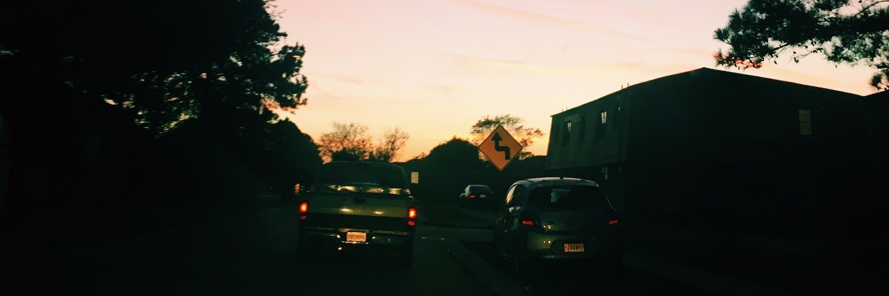 Dear Boyfriend Who Tries to Fully Understand My Depression sunset above traffic and suburban area