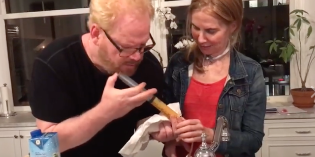 jim gaffigan using a syringe to inject his wife's feeding tube