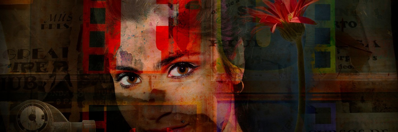Portrait of young woman wit flower on grunge abstract background