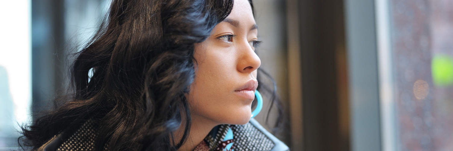 A Letter to Myself When I'm Struggling to Believe I’m Loved Woman looking at window