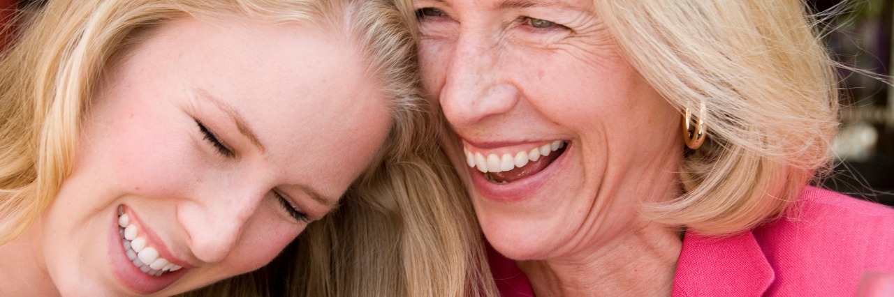 Daughter Wanting to Shield Mother From Chronic Pain and Hurt mother and daughter laughing