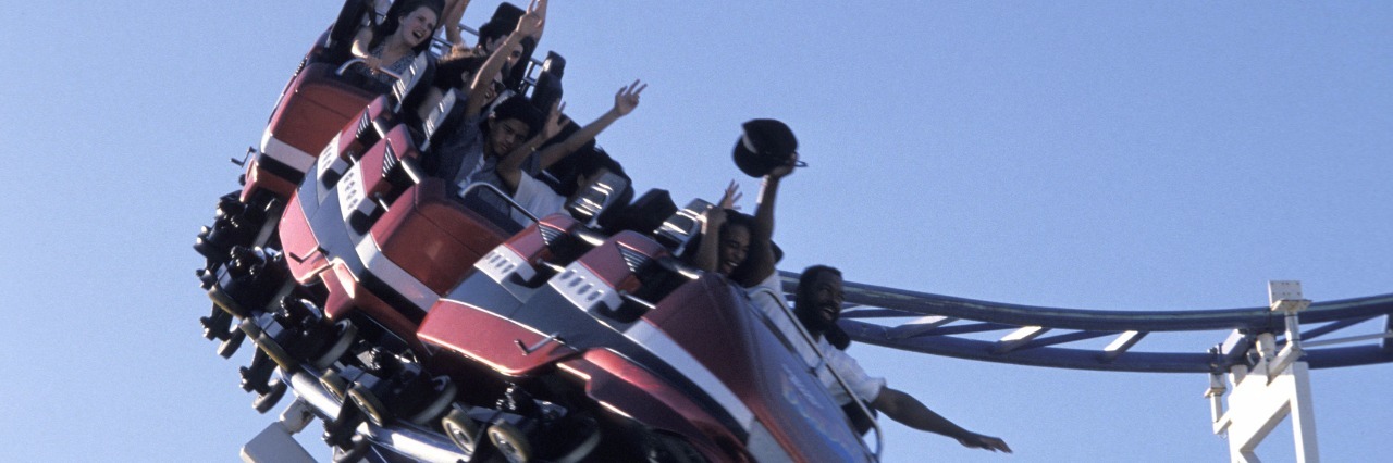 Ups and Downs of Life With Postural Orthostatic Tachycardia Syndrome people riding on a rollercoaster