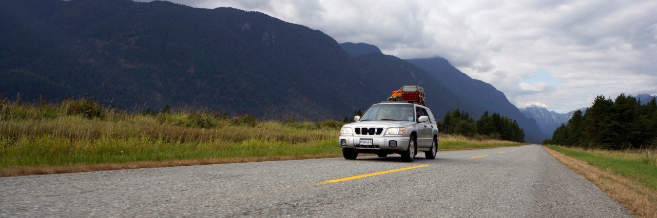 Moving Back Home Due to Chronic Pain and Bipolar Disorder sports utility vehicle on rural road