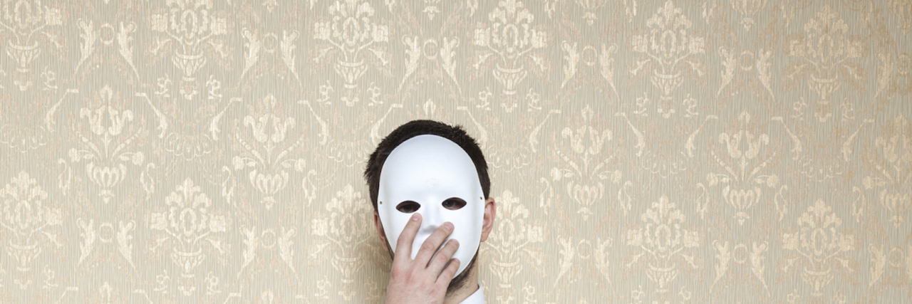 Welcome to the Masquerade of Mental Illness businessman hiding behind the mask