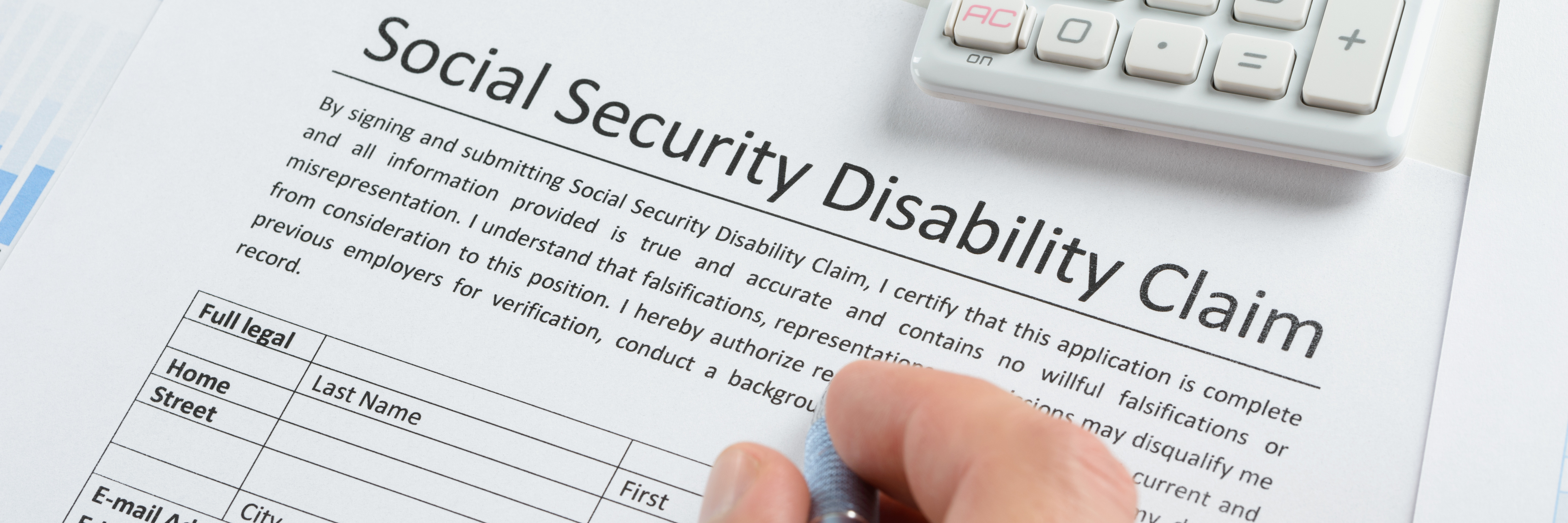 Getting 'the Letter' About My Social Security Disability Application Person filling out disability form.