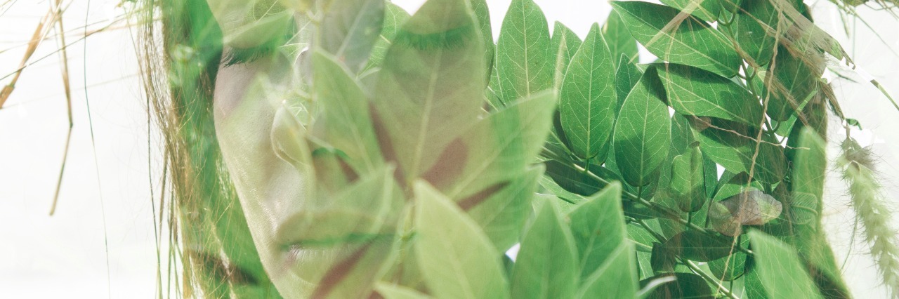 Taking off the 'Mask' That Hides My Depression and Anxiety Double exposure portrait of a girl combined with photograph of greenery