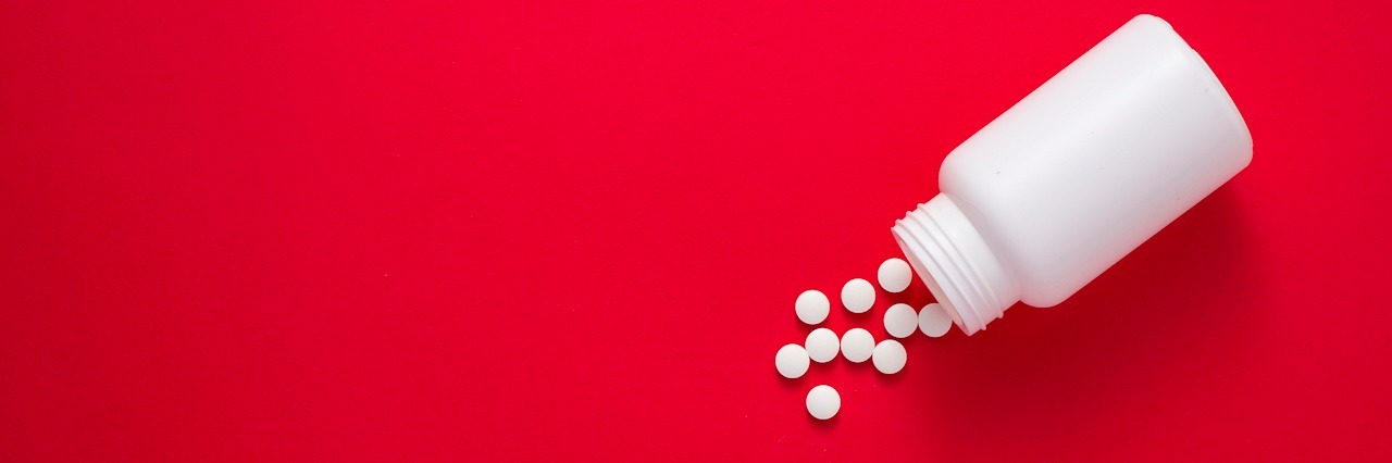 What They Didn't Tell Me After Starting Medication for Depression A medicine bottle toppled over