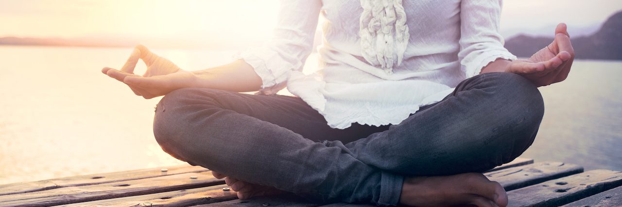How I Learned About Mindfulness A woman meditating