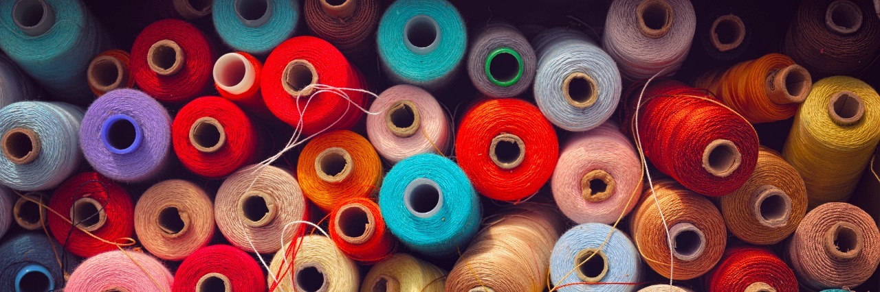 Large amount of different colored sewing thread