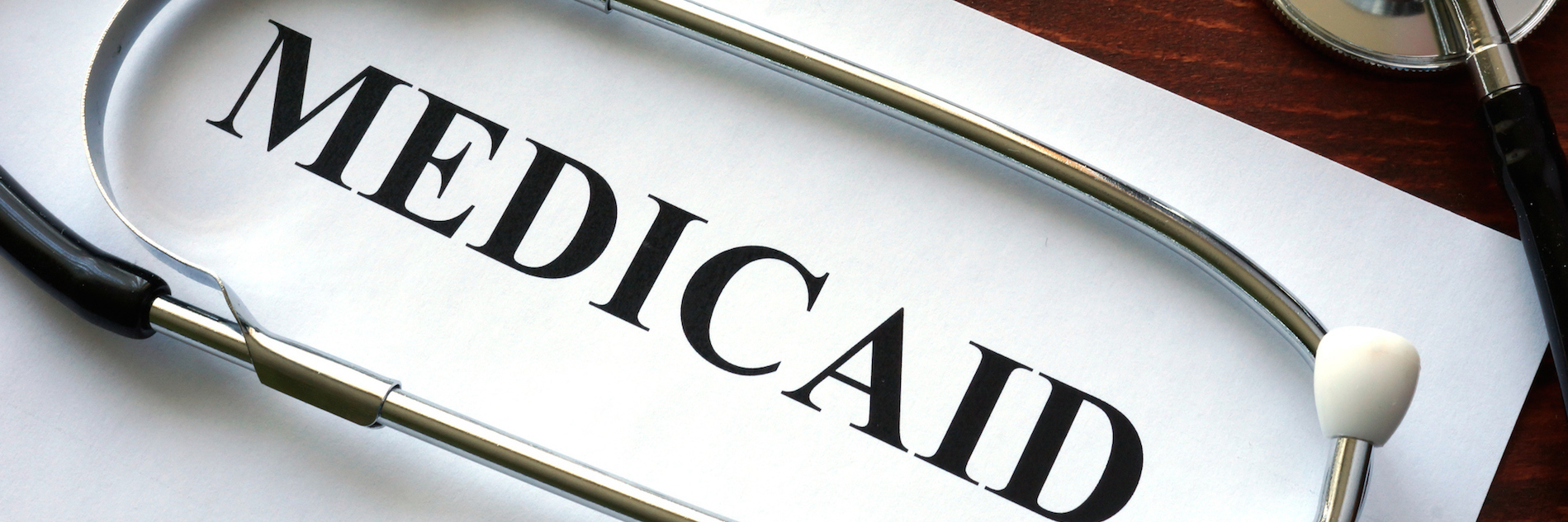 Response to Proposed Budget Cuts as Someone on the Autism Spectrum Paper that says Medicaid with a stethoscope over it