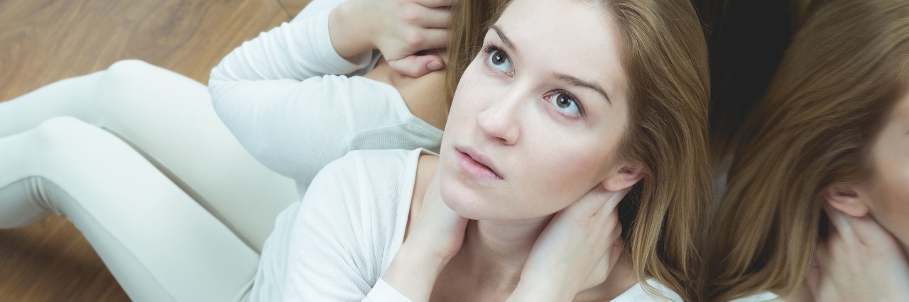 The Mental Battle Between Attention-Deficit Disorder and Anxiety woman split into three with mirrors looking anxious