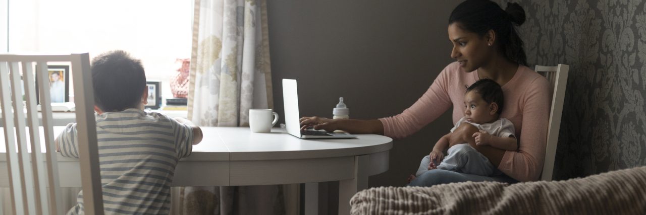 No One Tells the Single Mom With a Mental Illness How Best to Parent Mother multi-tasking work and children