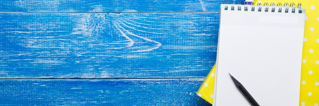 Dear Depression, Thank You Notebook on Blue Table