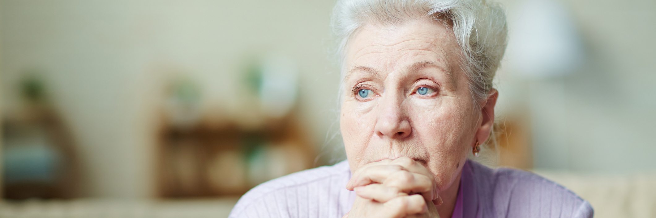 My Chronic Illness Needs Me to Acquire Patience An older woman sits, looking unhappy.