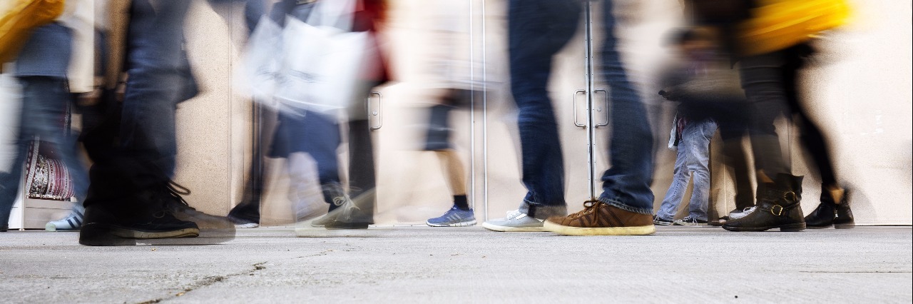 What It Feels Like to Experience Hypomania blurry people on sidewalk