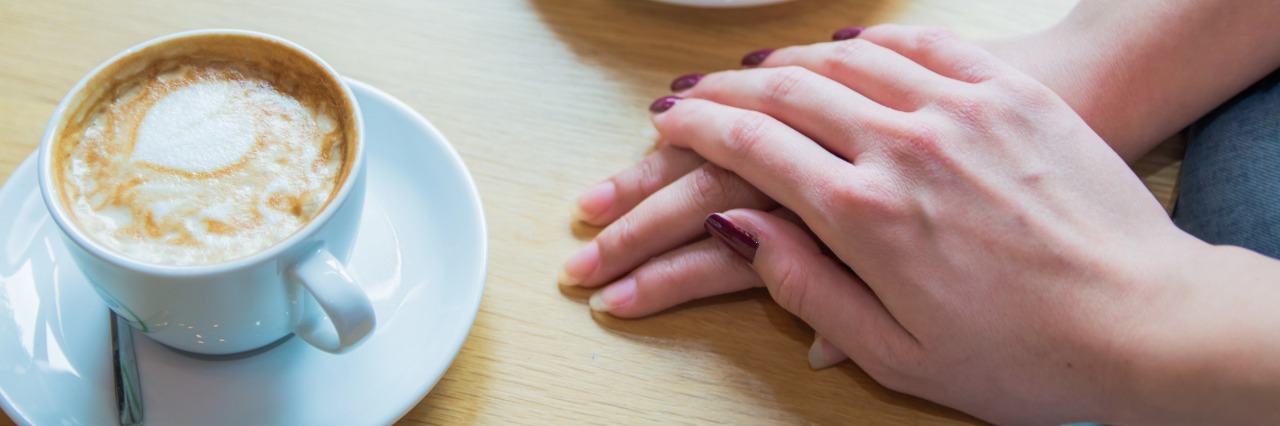 What to Do When Your Chronically Ill Friend Says, 'I'm Fine' a friend comforting her friend over coffee