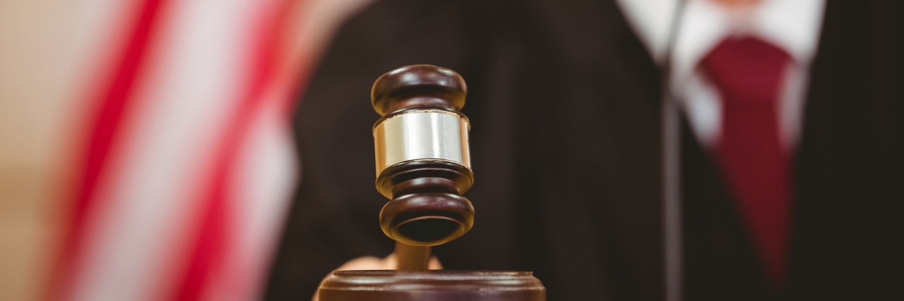 What I Surprisingly Witnessed in a Mental Health Courtroom Stern judge about to bang gavel on sounding block in the court room