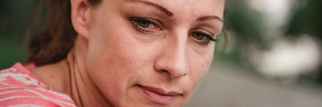Dear Mom – When You Cried After My Doctor's Appointment Upset woman, looking to her side.