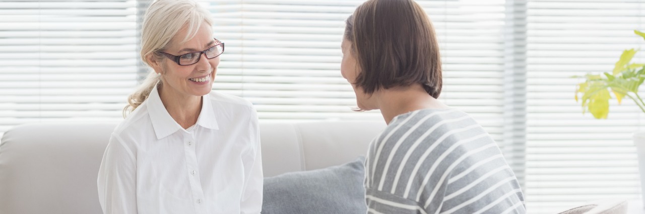 Migraines, Aphasia: Thank You to Therapist for Guidance and Support woman talking to therapist