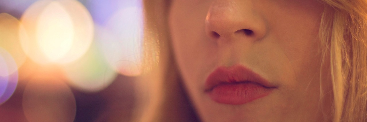 Why It's Hard for Someone With Anxiety to Trust Close up of a woman's face