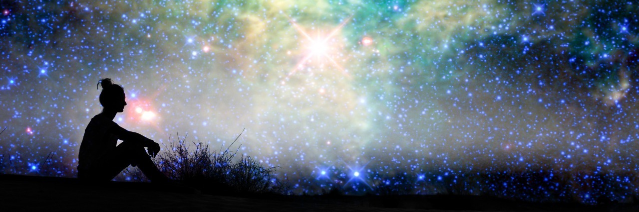 Processing Emotions Caused by Chronic Illness silhouette of a woman sitting outside under a starry sky