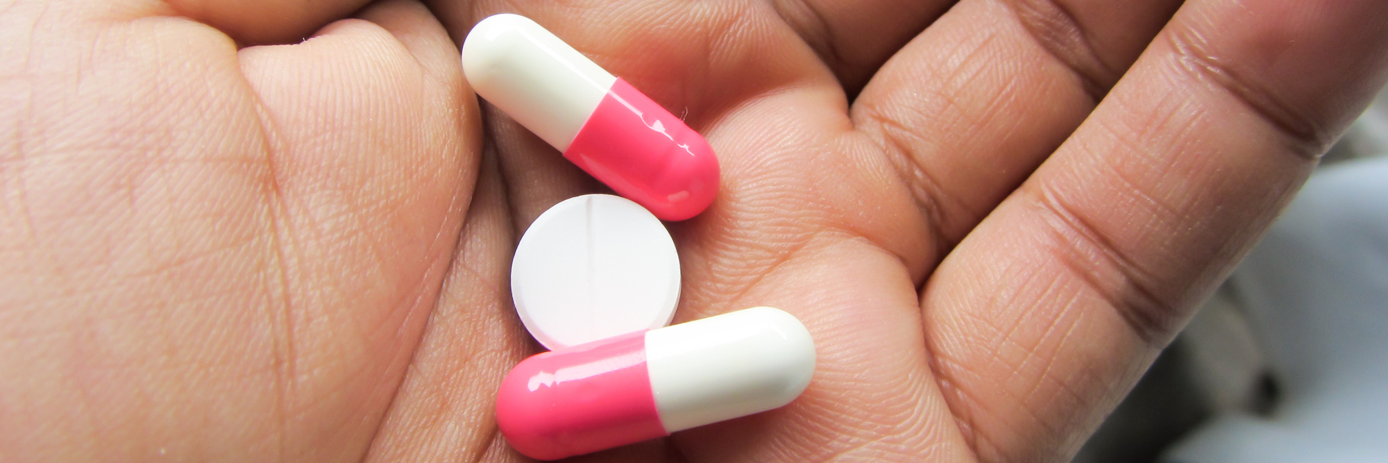 When I Called My Local TV Station About Opioids and Chronic Pain Medicine pill and capsules in hand