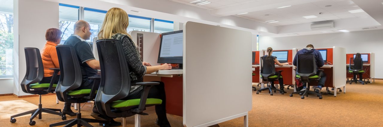 The Disparaging Conversation I Overheard at Work About Mental Illness Modern IT classroom interior with orange carpet flooring