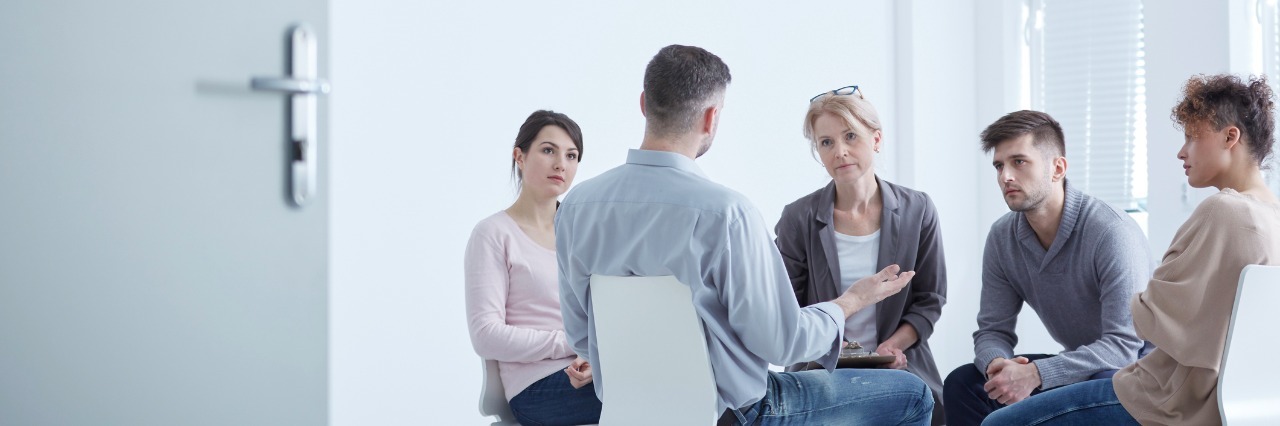 Why Group Therapy Is Beneficial for Depression Recovery People participating in group therapy for PTSD