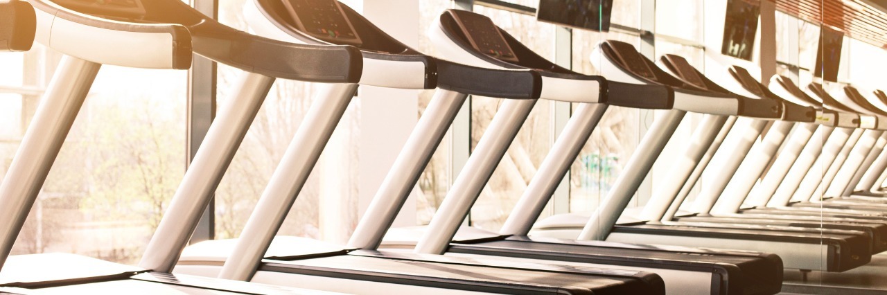 Why I Don't Go to the Gym Due to Mast Cell Activation Disorder The abstract blur fitness gym background at sunny day