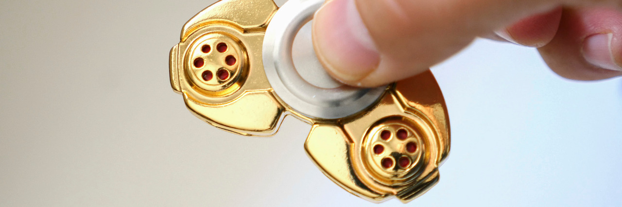 Banning Fidget 'Toys' Hurts Kids With Disabilities Fidget spinner toy.