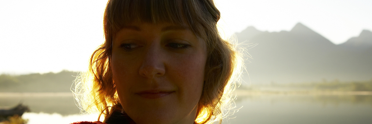 I'm Not Inconsiderate, I Have ADHD A woman at a lake