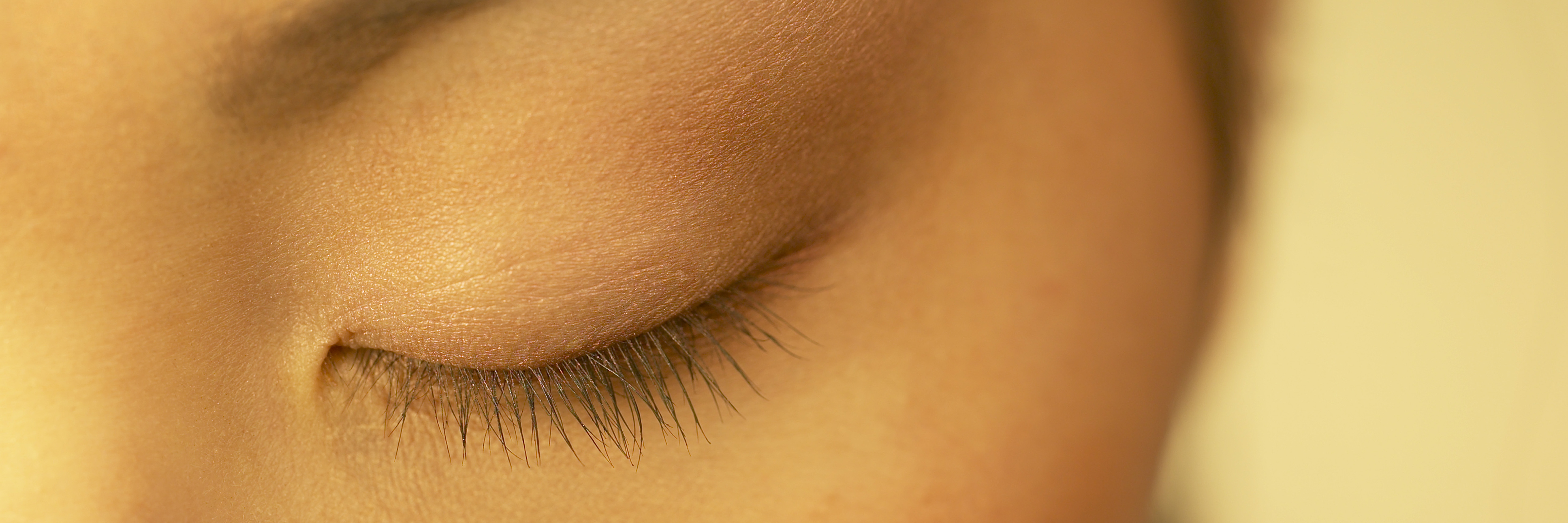 close up of woman's closed eye