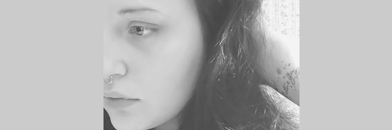 Katelyn Todd's Post About Brushing Hair and Depression Goes Viral Image of a woman brushing her hair