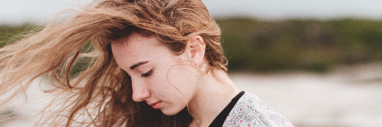 What I Tell Myself When Depression Makes Me Think Suicide Is an Option girl hair blowing in wind