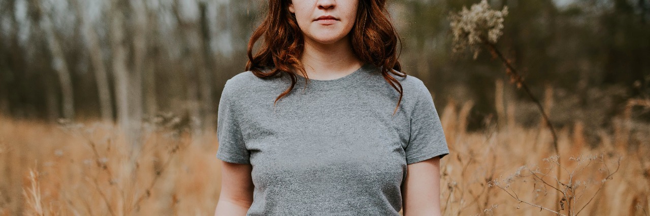 Self-Compassion After Post-Traumatic Stress Disorder Diagnosis girl in field