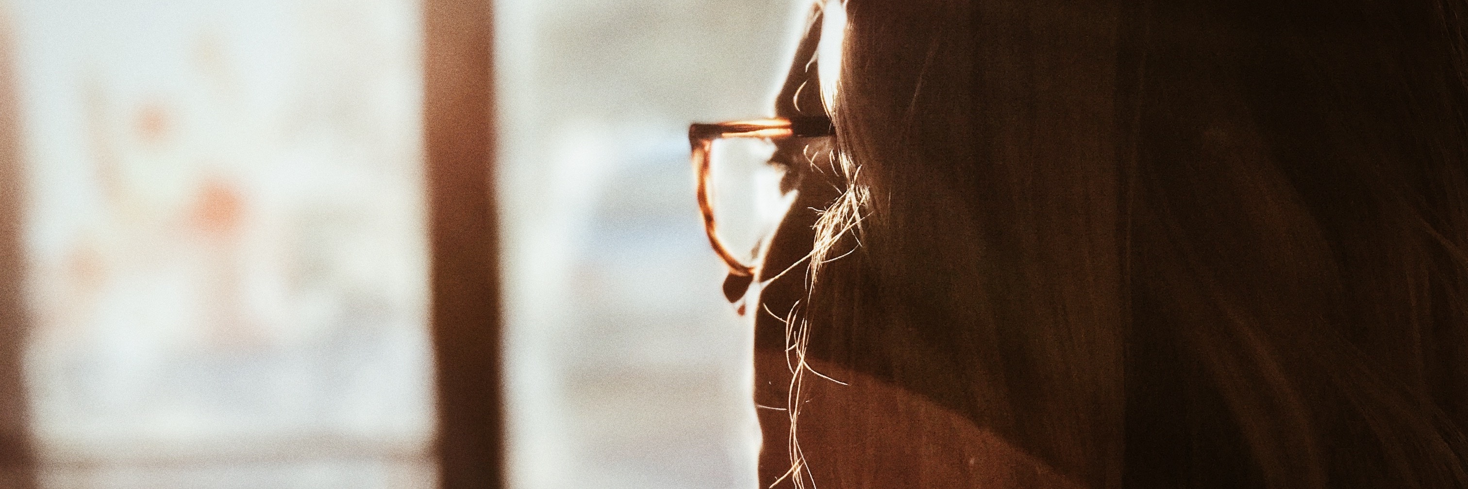 We Cannot Continue to Deny Treatment to People With EDNOS woman looking out the window