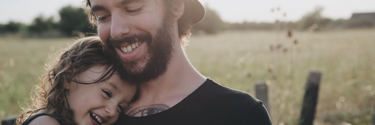 4 Tips for Talking to Your Kids About PTSD dad and daughter