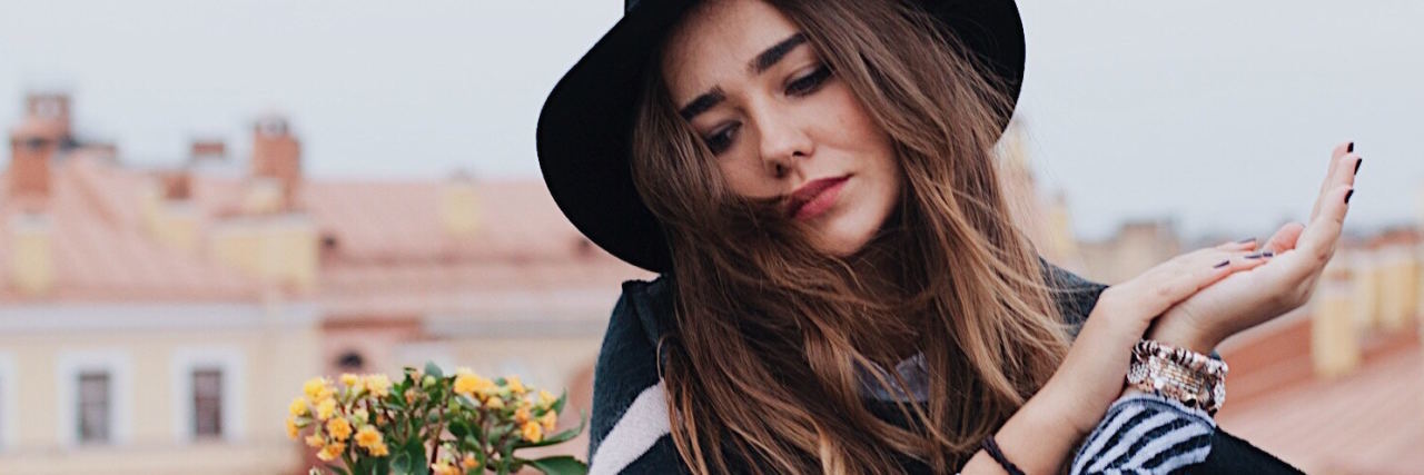 How I Feel About Borderline Personality Disorder Awareness Month woman in hat